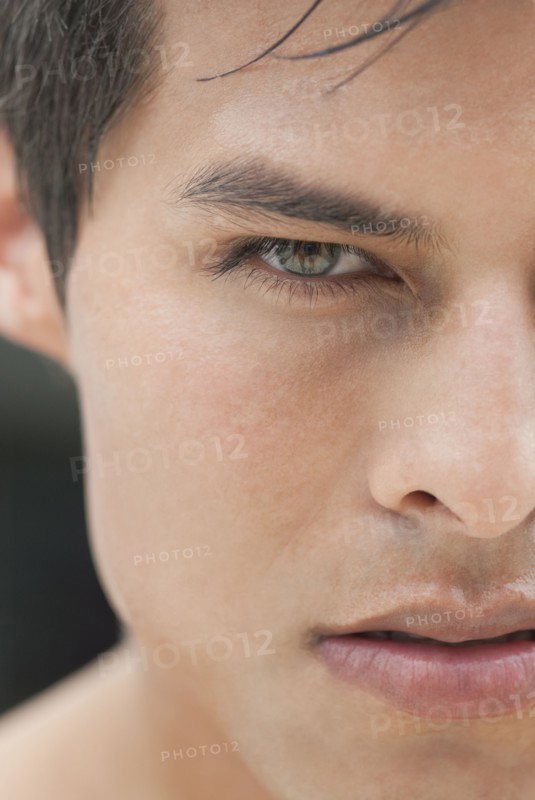 Close up of angry Hispanic man