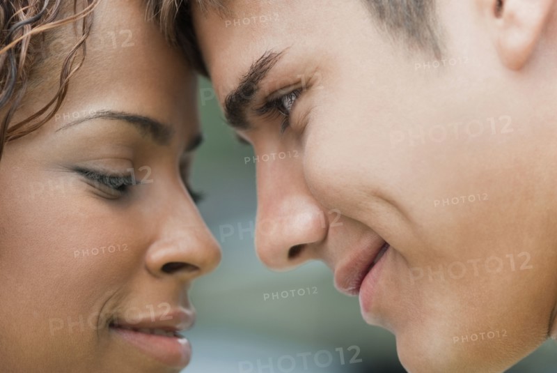 Smiling couple looking at each other