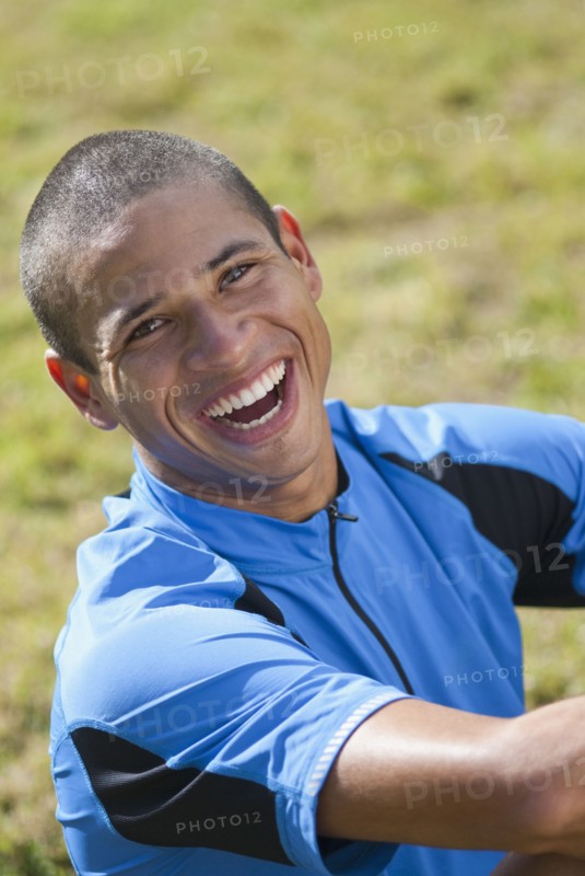 Smiling Hispanic athlete