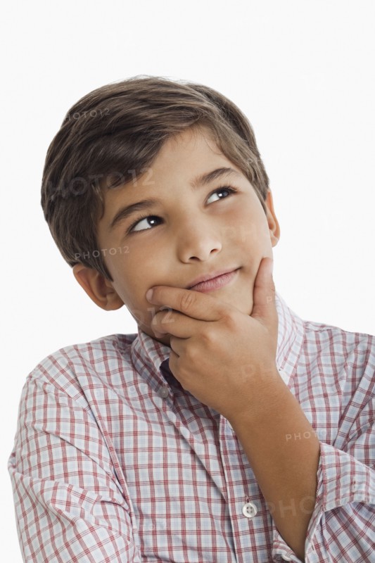 Hispanic boy thinking