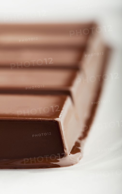 Melting bar of chocolate
