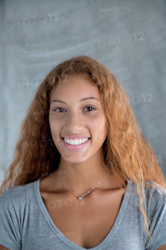 Portrait of smiling Mixed Race woman