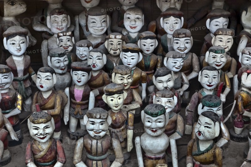 Rows of Vietnamese puppet figures