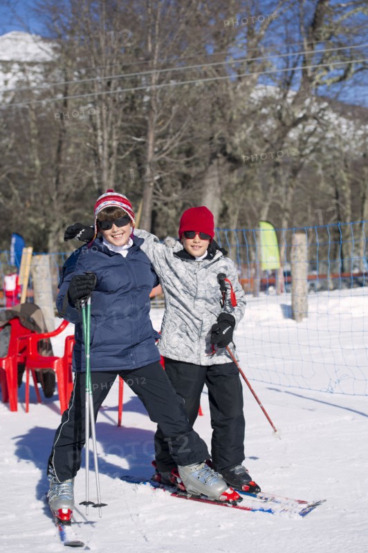 Hispanic boys skiing