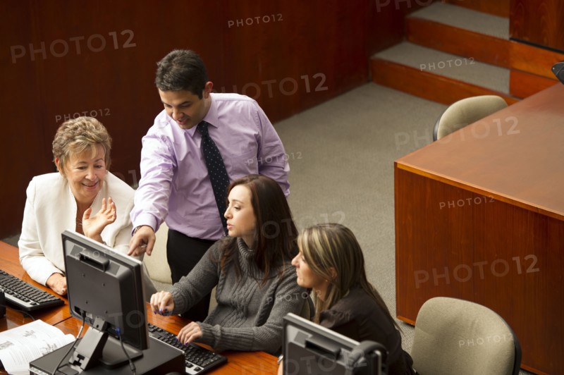 Hispanic business people working together