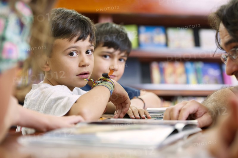Hispanic students in library