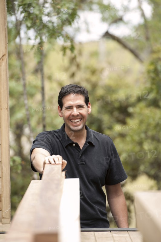 Smiling Hispanic carpenter