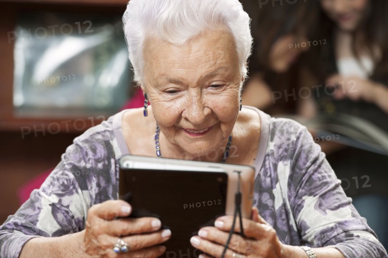 Hispanic woman using digital tablet