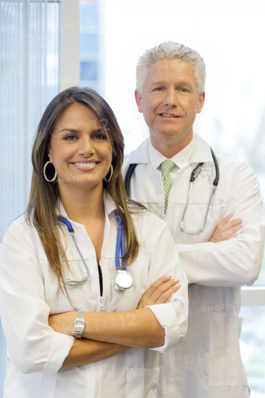 Doctors standing with arms crossed