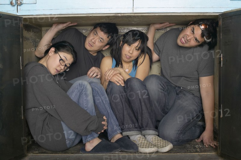 Multi-ethnic group squeezed in small space