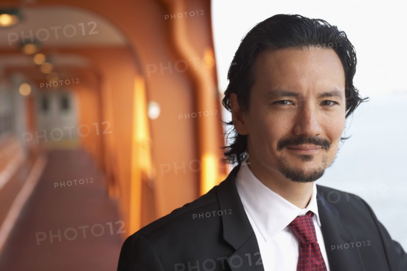 Smiling mixed race businessman