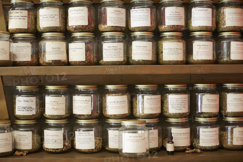 Jars of variety of teas in tea shop