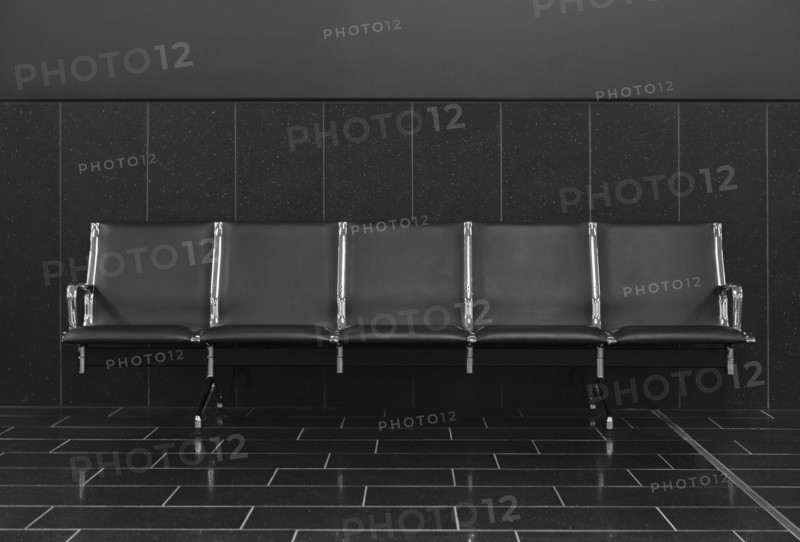 Empty seats in airport lobby