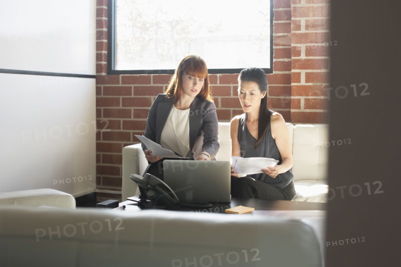 Businesswomen working together in office