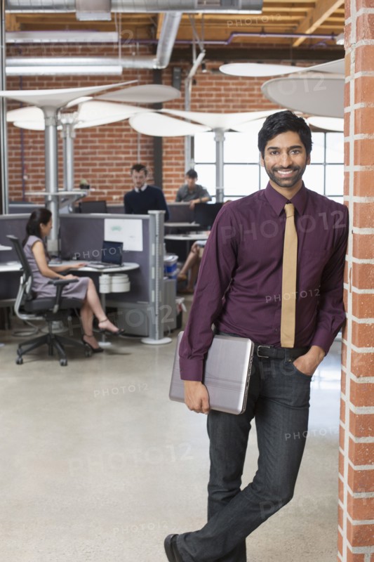 Businessman smiling in office