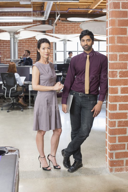 Business people smiling in office