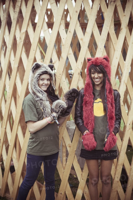 Women wearing furry hats outdoors