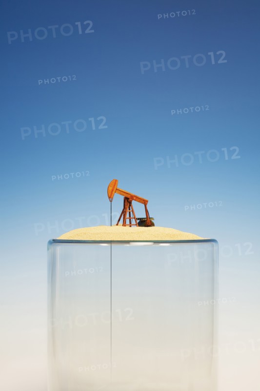 Oil pump on top of empty glass