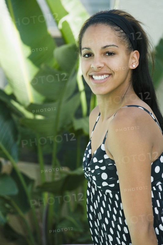 Mixed race woman posing outdoors