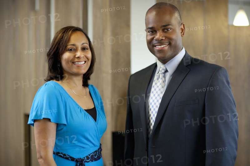 African American business people standing in office
