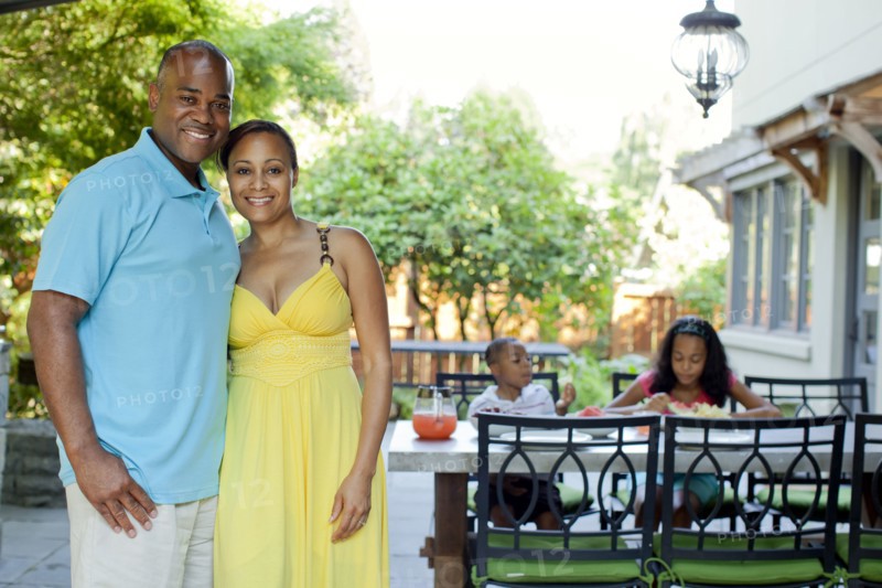 African American family enjoying patio