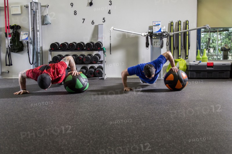 Men working out in gym