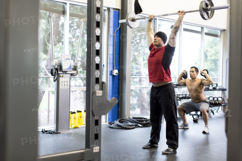Men working out in gym