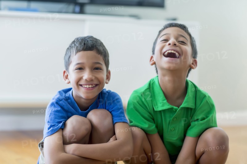 Hispanic boys smiling
