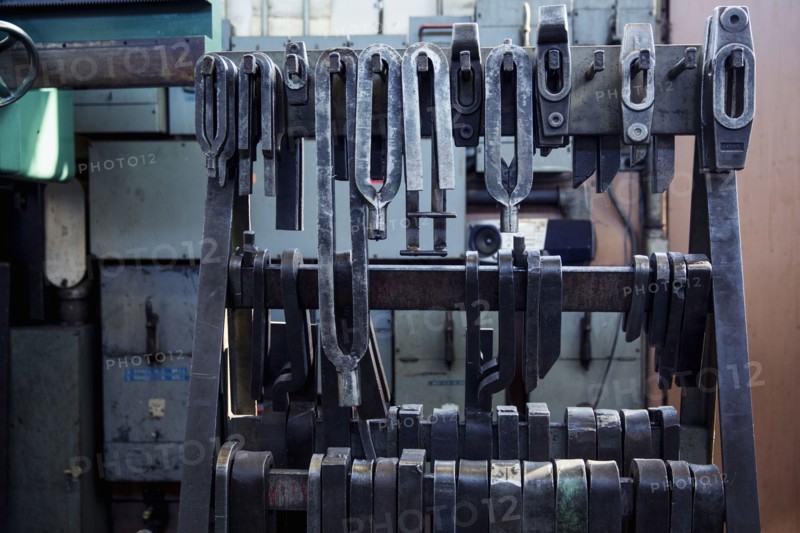 Metal parts hanging in metal shop
