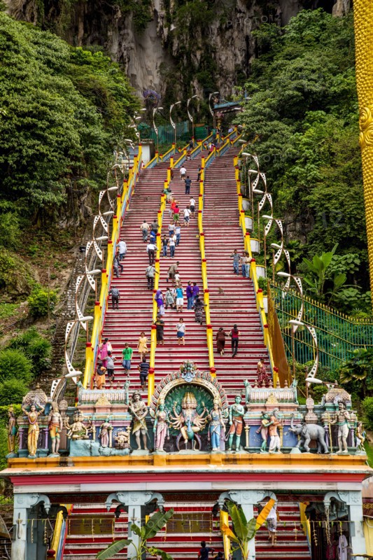 People climbing steps to Hindu shrine at Batu Caves
