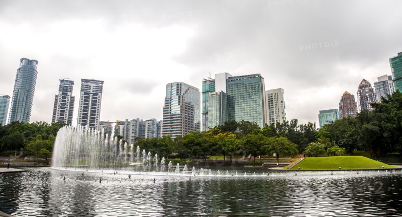 Fountain in lake in urban park