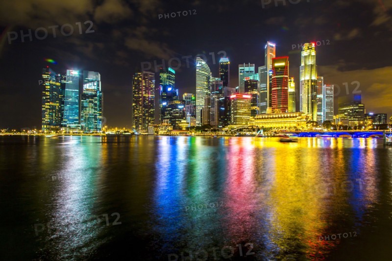Singapore city skyline lit up at night