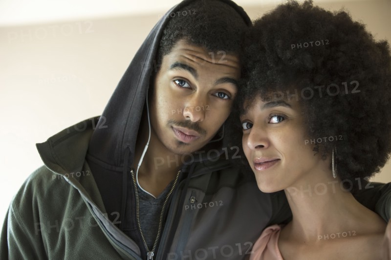 Mixed race mother and son smiling