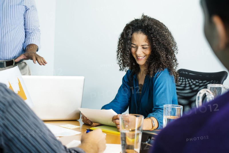 Business people talking in office meeting