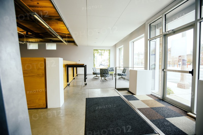 Furniture and door in empty office