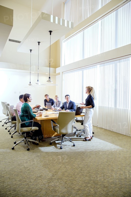 Business people talking in office meeting