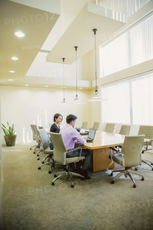 Business people talking in office meeting