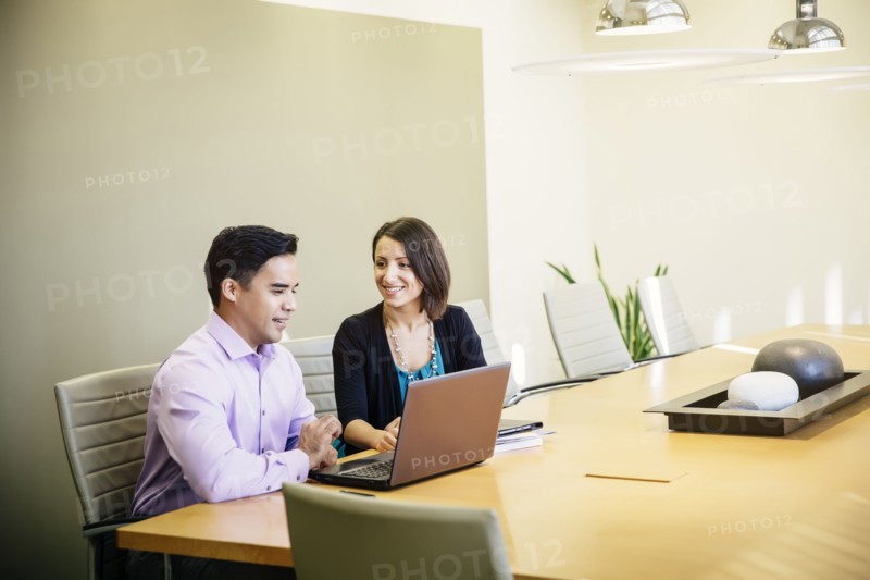 Business people talking in office meeting