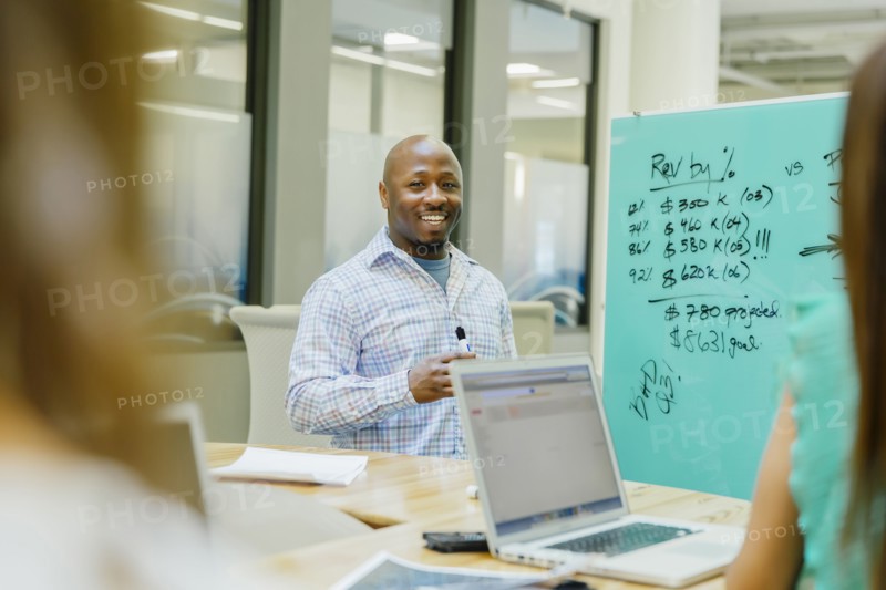 Businessman talking in office meeting