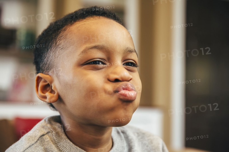 Close up of Black boy making a face