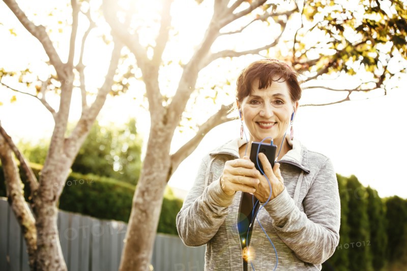 Caucasian woman using cell phone outdoors