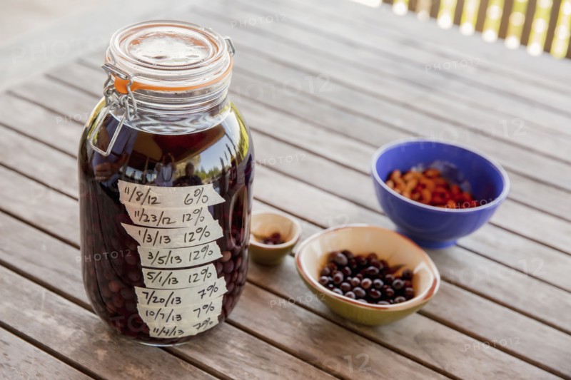 Olives with nuts on table