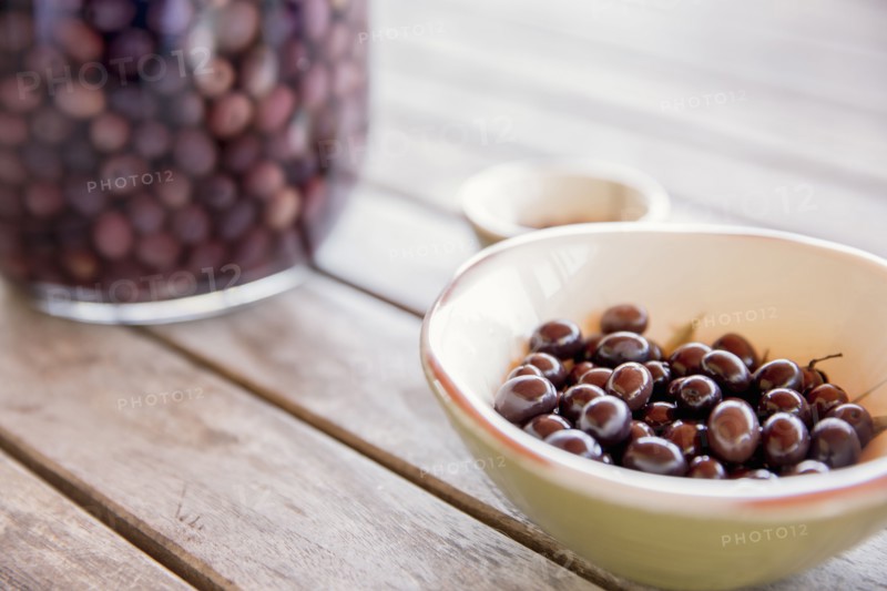 Bowl of olives on table