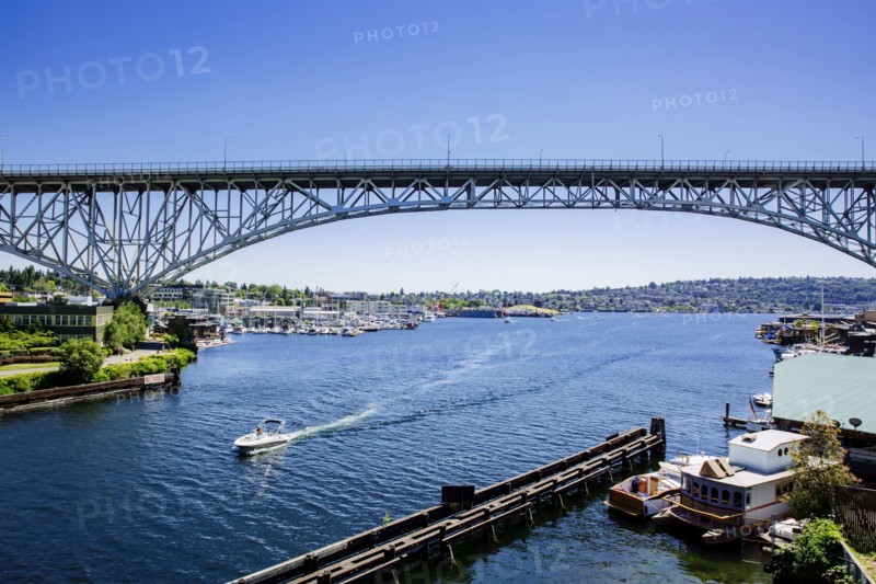 Blue sky and bridge over urban marina
