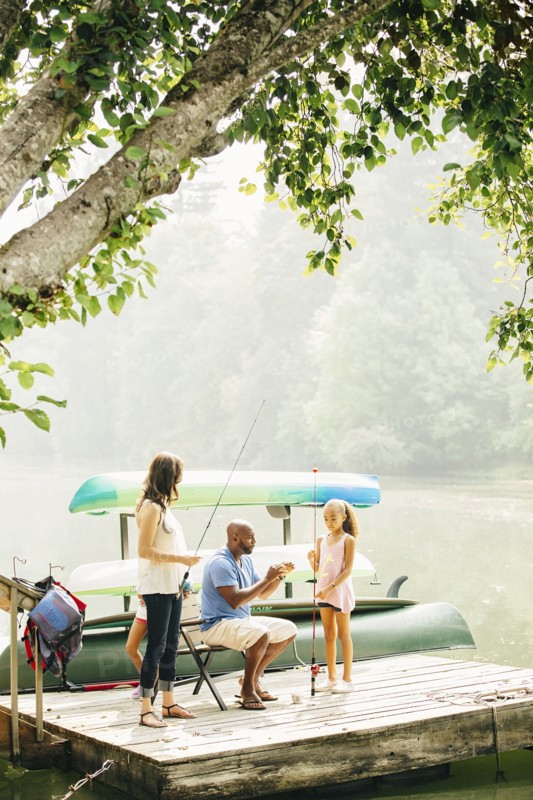 Family fishing in lake