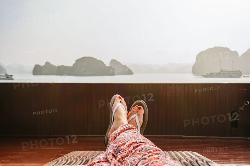 Caucasian woman on boat in Ha Long Bay