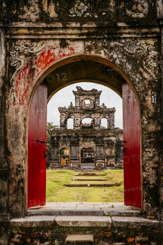 Ornate archway in dilapidated ruins