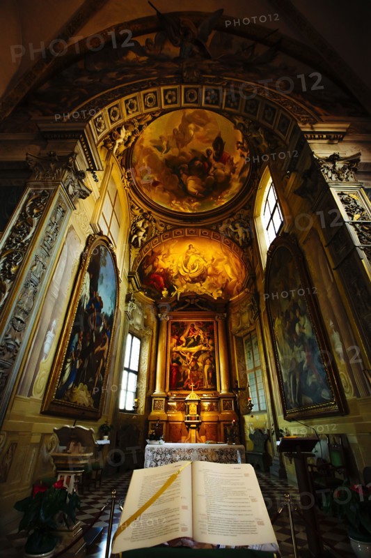 Bible on pedestal in ornate church