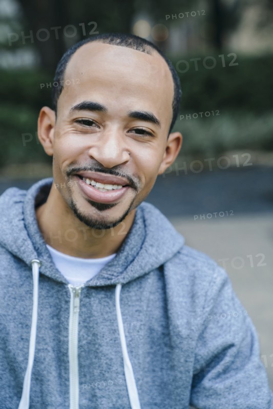 Portrait of smiling Black man with goatee