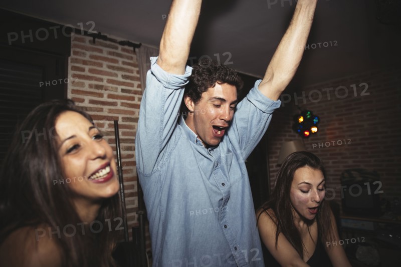 Friends cheering in nightclub